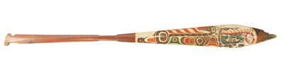 Lot 318 - A 19TH CENTURY AMERICAN TRIBAL STAINED SOFTWOOD DANCE PADDLE