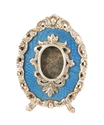 Lot 193 - A FABERGE LATE 19TH/EARLY 20TH CENTURY SILVER AND BLUE GUILLOCHE ENAMEL OVAL PICTURE FRAME