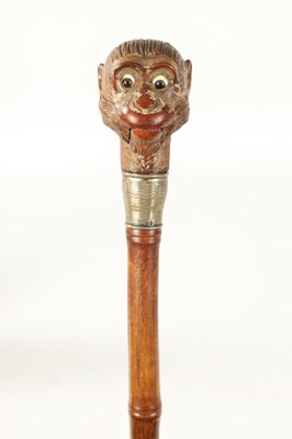 Lot 398 - A LATE 19TH CENTURY NOVELTY WALKING STICK FORMED AS A MONKEY HEAD WITH AUTOMATON EYES AND MOUTH