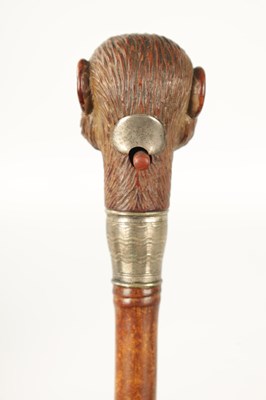 Lot 511 - A LATE 19TH CENTURY NOVELTY WALKING STICK FORMED AS A MONKEY HEAD WITH AUTOMATON EYES AND MOUTH