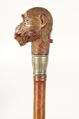 Lot 511 - A LATE 19TH CENTURY NOVELTY WALKING STICK FORMED AS A MONKEY HEAD WITH AUTOMATON EYES AND MOUTH