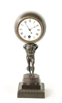 Lot 630 - A GOOD REGENCY FRENCH BRONZE “ATLAS” MANTEL CLOCK