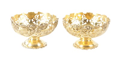 Lot 285 - A PAIR OF GEORGE V SILVER GILT BON BON DISHES