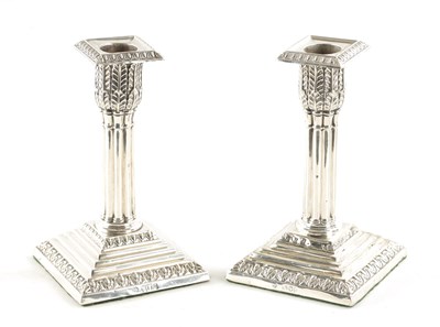 Lot 63 - A PAIR OF LATE 19TH CENTURY SILVER CANDLESTICKS