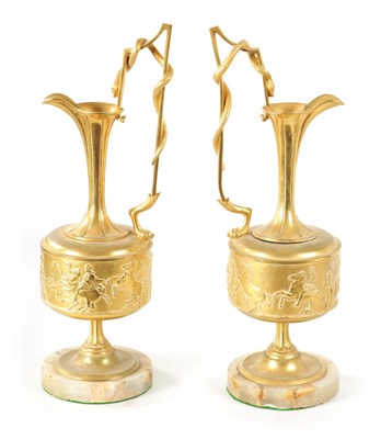 Lot 408 - A PAIR OF LATE 19TH CENTURY FRENCH GILT BRONZE CLASSICAL EWERS ON ALABASTER BASES