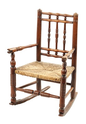 Lot 945 - A 19TH CENTURY FRUITWOOD CHILDS ROCKING CHAIR