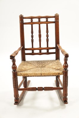 Lot 945 - A 19TH CENTURY FRUITWOOD CHILDS ROCKING CHAIR