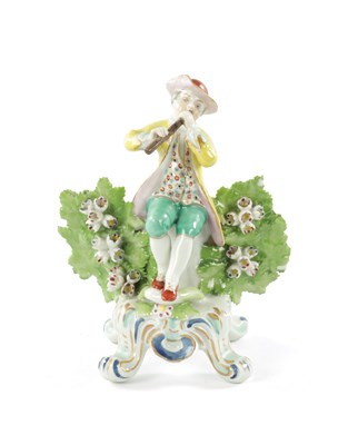 Lot 124 - A 19TH CENTURY PORCELAIN FIGURE POSSIBLY BOW OF A FLUTE PLAYER