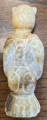Lot 501 - A CHINESE CARVED JADE RELIGIOUS FIGURE