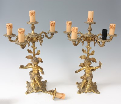 Lot 465 - A PAIR OF 20TH CENTURY FOUR BRANCH CAST BRASS...