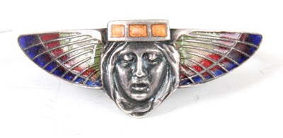 Lot 471 - A SILVER METAL AND ENAMELLED WINGED MASK HEAD...