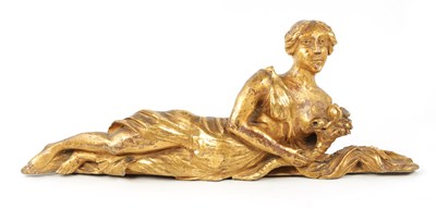 Lot 325 - AN 18TH CENTURY CARVED GILT WOOD FIGURE OF A RECLINING FEMALE