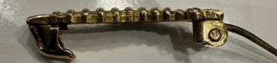 Lot 821 - A RARE WW2 GOLD CATERPILLAR CLUB BADGE WITH RUBY EYES AWARDED TO SERGEANT S.J. HARDING
