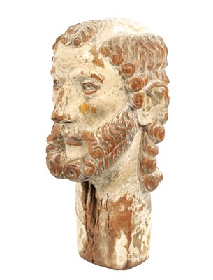 Lot 548 - A 17TH CENTURY CARVED WOODEN POLYCHROME DECORATED HEAD POSSIBLY OF JOHN THE BAPTIST IN THE MANNER OF JORG ZURN