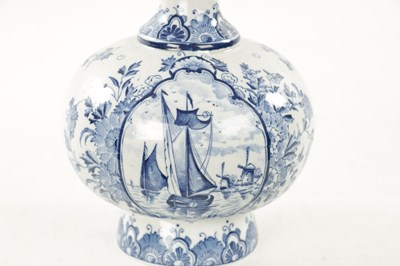 Lot 464 - A 19TH CENTURY BLUE AND WHITE DELFT BOTTLE VASE