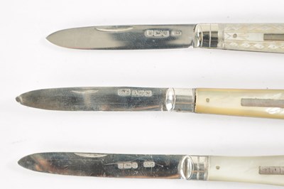 Lot 722 - A COLLECTION OF FOUR 19TH CENTURY SILVER FOLDING POCKET FRUIT KNIVES