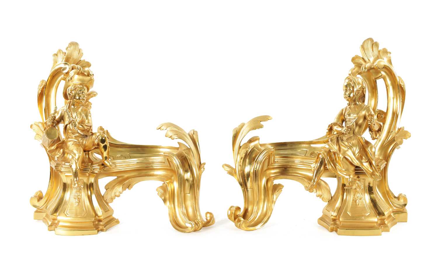 Lot 1003 - A PAIR OF 19TH CENTURY GILT ORMOLU CHENETS OF ROCOCO CHIPPENDALE DESIGN