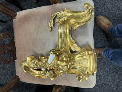 Lot 1003 - A PAIR OF 19TH CENTURY GILT ORMOLU CHENETS OF ROCOCO CHIPPENDALE DESIGN