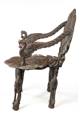 Lot 594 - A 19TH CENTURY ANGLO-INDIAN CARVED HARDWOOD ARMCHAIR