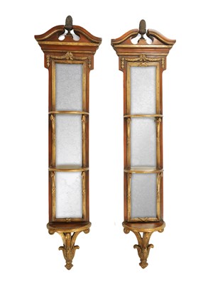 Lot 1466 - A PAIR OF REPRODUCTION GEORGE II STYLE PARCEL GILT AND WALNUT HANGING MIRRORS