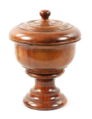Lot 1069 - A 19TH CENTURY TREENWARE TURNED WALNUT CUP AND COVER OF LARGE SIZE