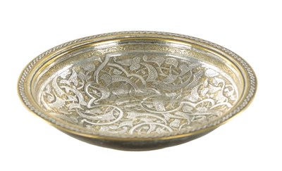 Lot 535 - AN 18TH/19TH CENTURY  MIDDLE EASTERN CAST BRASS AND SILVER INLAY SHALLOW BOWL
