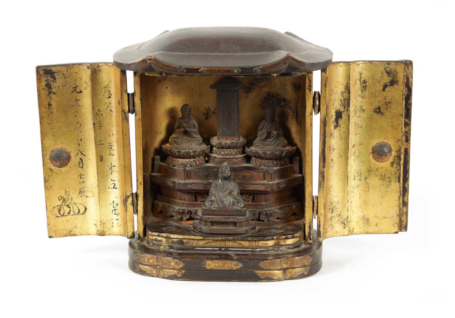 Lot 538 - A 19TH CENTURY BLACK LACQUER BUDDHIST TRAVELLING PRAYER SHRINE