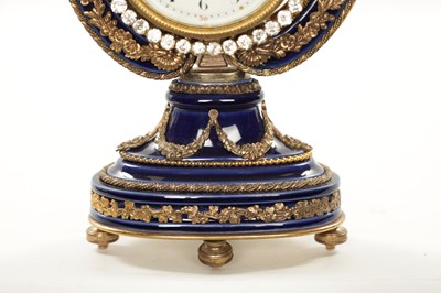 Lot 1318 - A LATE 19TH CENTURY FRENCH PORCELAIN AND ORMOLU MOUNTED LYRE-SHAPED MANTEL CLOCK