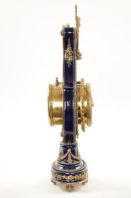 Lot 1318 - A LATE 19TH CENTURY FRENCH PORCELAIN AND ORMOLU MOUNTED LYRE-SHAPED MANTEL CLOCK