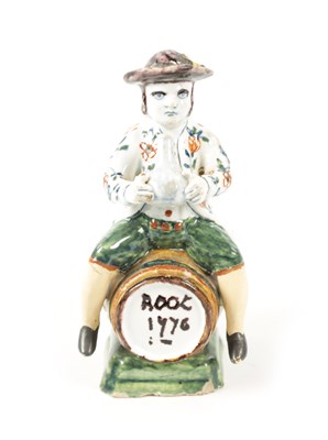 Lot 465 - AN 18TH / 19TH CENTURY DELFT POLYCHROME FIGURE