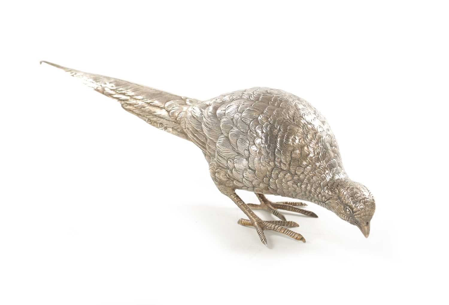Lot 665 - AN EARLY 20TH CENTURY SILVER SCULPTURE OF COCK PHEASANT