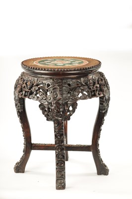 Lot 591 - A 19TH CENTURY CHINESE HARDWOOD JARDINIERE STAND WITH CANTON PORCELAIN TOP