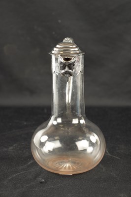 Lot 688 - A VICTORIAN SILVER MOUNTED GLASS CLARET JUG