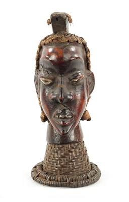 Lot 393 - AN OLD AFRICAN WICKER AND PARDIMENT TRIBAL HEAD POSSIBLY YORUBA