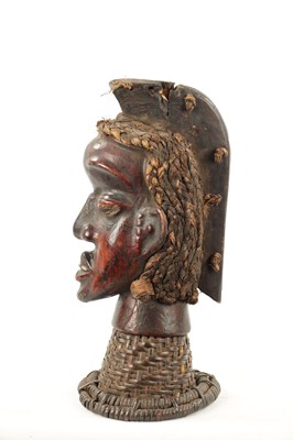 Lot 393 - AN OLD AFRICAN WICKER AND PARDIMENT TRIBAL HEAD POSSIBLY YORUBA