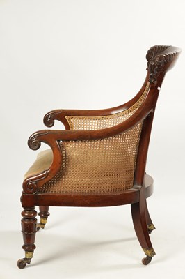 Lot 307 - A GOOD WILLIAM V CARVED MAHOGANY BERGERE LIBRARY CHAIR WITH OLD LANCASTER PAPER LABEL - POSSIBLY GILLOWS