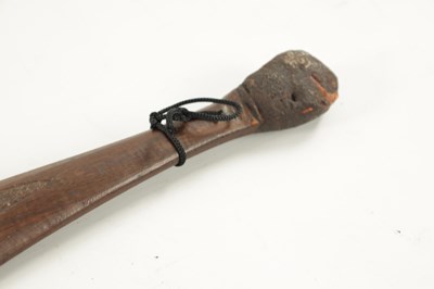 Lot 298 - AN ABORIGINAL MULGA WOOD SPEAR THROWER  WITH CARVED ANIMALS AND AN OLD BOOMERANG.