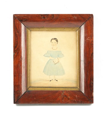 Lot 286 - A REGENCY NAÏVE WATERCOLOUR STANDING PORTRAIT OF A CHILD.