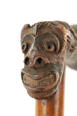 Lot 77 - A RARE TWO HEADED GROTESQUE 19TH CENTURY AFRICAN WALKING STICK
