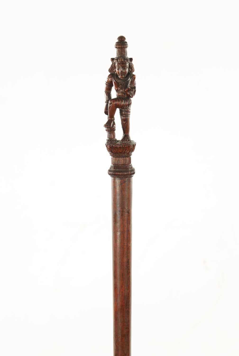 Lot 184 - AN EARLY 20TH CENTURY INDIAN CARVED HARDWOOD CANE WITH CARVED GODESS HANDLE