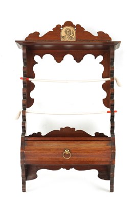 Lot 253 - A 19TH CENTURY MAHOGANY HANGING PIPE RACK