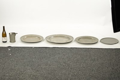 Lot 273 - A SET OF FOUR 18TH CENTURY PEWTER PLATES AND A LIPPED TANKARD