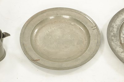 Lot 273 - A SET OF FOUR 18TH CENTURY PEWTER PLATES AND A LIPPED TANKARD
