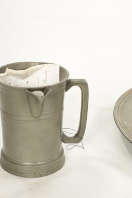 Lot 273 - A SET OF FOUR 18TH CENTURY PEWTER PLATES AND A LIPPED TANKARD