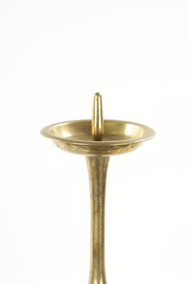Lot 167 - A 19TH CENTURY EASTERN BRASS CANDLESTICK