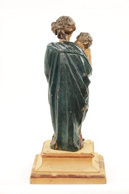 Lot 291 - AN EARLY 18TH CENTURY POLYCHROME CARVING OF MADONNA AND CHILD