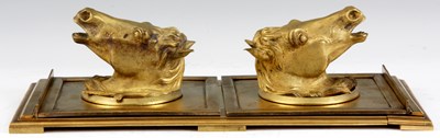 Lot 525 - A LATE 19TH CENTURY ORMOLU SLIDING BOOK STAND...