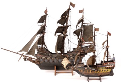 Lot 526 - TWO 19TH CENTURY WOODEN MODELS OF GALLEONS...