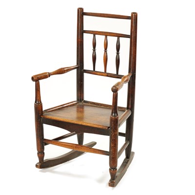 Lot 300 - A 19TH CENTURY ELM CHILD'S SPINDLE BACK ROCKING CHAIR