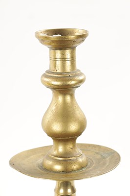 Lot 202 - A LARGE PAIR OF 18TH CENTURY BRASS CANDLESTICKS